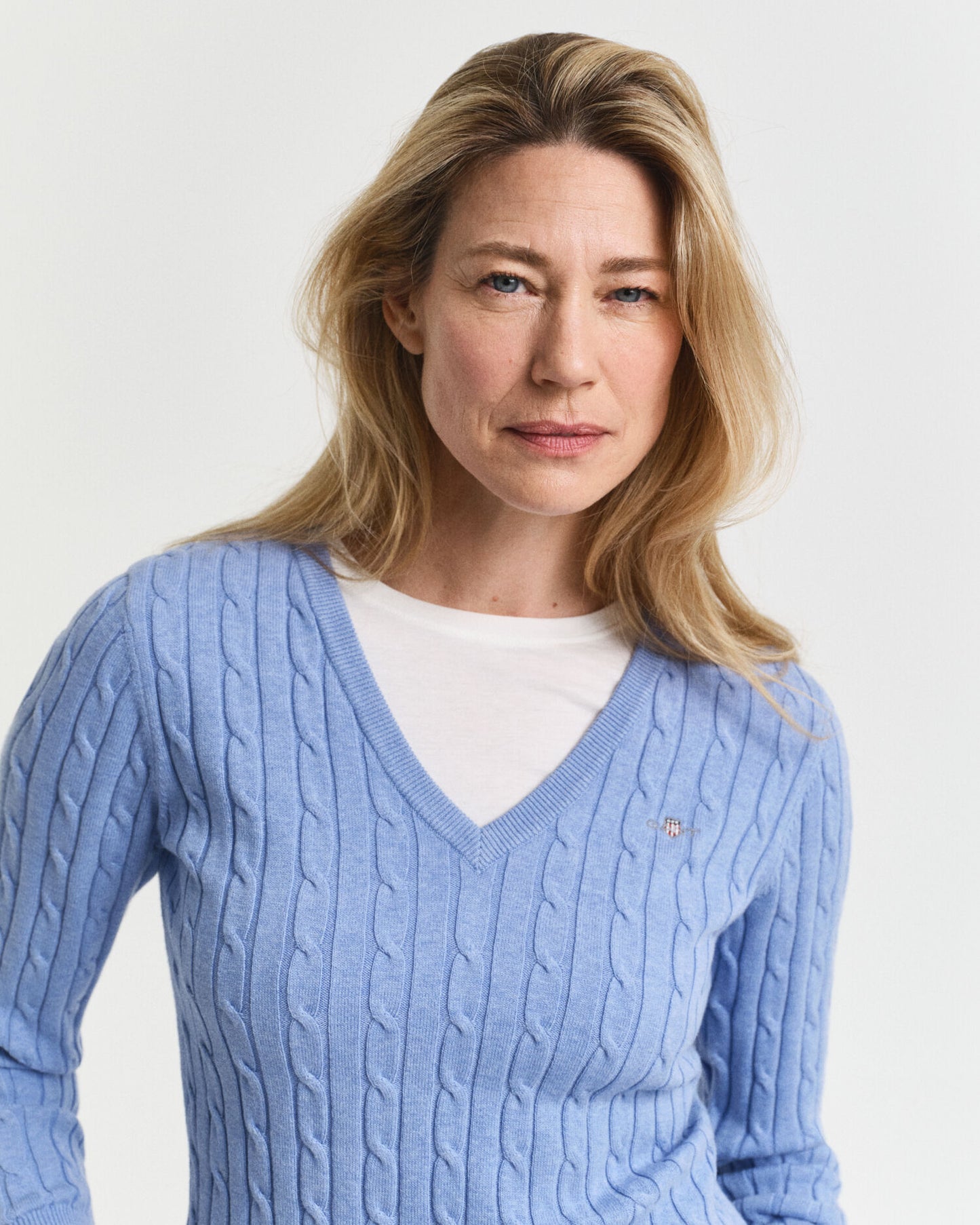 Pullover mit V-Ausschnitt aus Baumwoll-Stretch-Zopfstrick