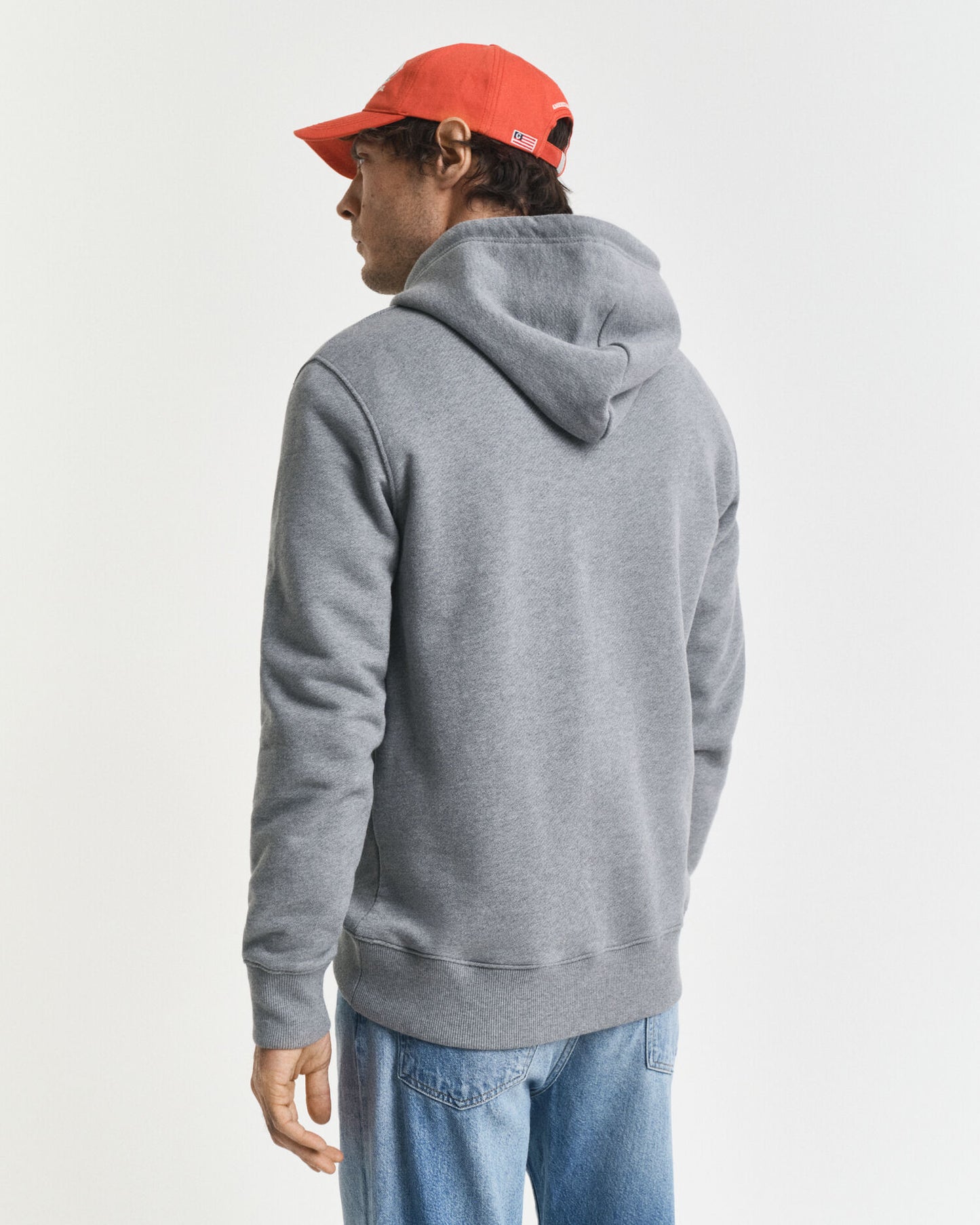 Sweat à capuche petit motif graphique